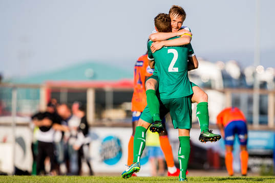 Bjarte Haugsdal and Erlend Hellevik Larsen of Nest-Sotra celebrate