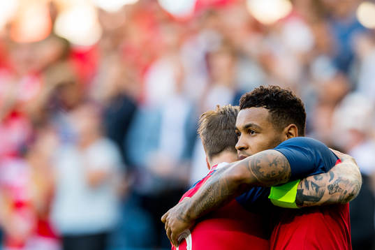Joshua King of Norway celebrates with teammate Stefan Johansen after scoring 1-0
