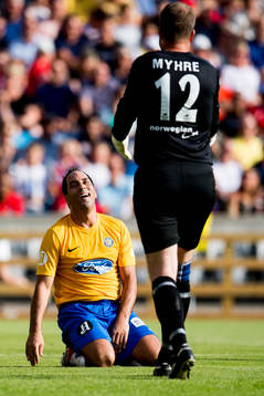 Edmundo of Brazil and goalkeeper Thomas Myhre of Norway