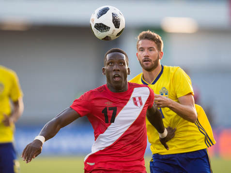 Luis Advincula of Peru and Marcus Rohdén of Swedenduring the international friendly football match between Sweden and Peru