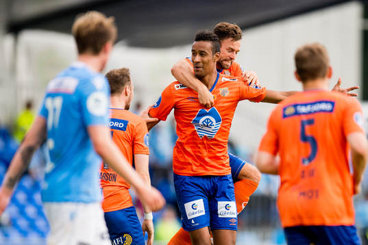 Sonni Nattestad of Aalesund celebrates with his teammates after scoring the 2-1 goal