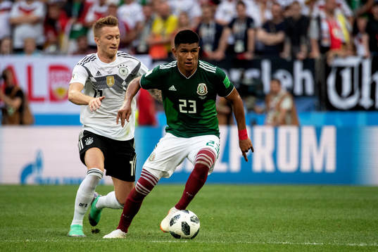 Marco Reus of Germany and Jesus Gallardo of Mexico