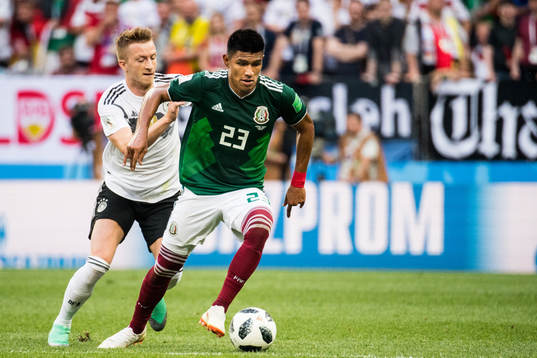 Marco Reus of Germany and Jesus Gallardo of Mexico