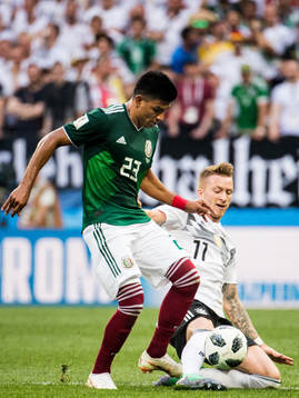 Marco Reus of Germany and Jesus Gallardo of Mexico