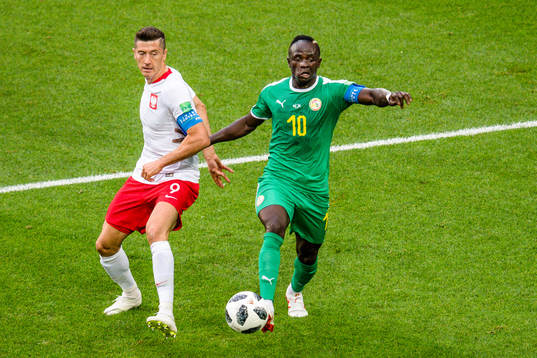 Robert Lewandowski of Poland and Sadio Mane of Senegal