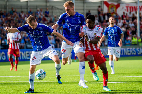 Jon-Helge Tveita, Joonas Tamm of Sarpsborg 08 and Mushaga
