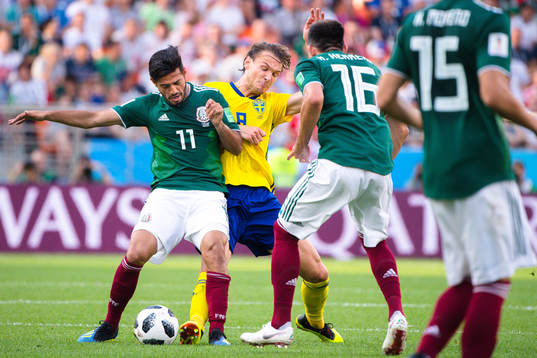 Carlos Vela and Hector Herrera of Mexico against Albin