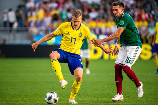 Viktor Claesson of Sweden and Hector Herrera of Mexico