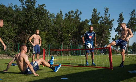 Robin Olsen, Andreas Granqvist and Sebastian Larsson of the Swedish national football team play football tennis