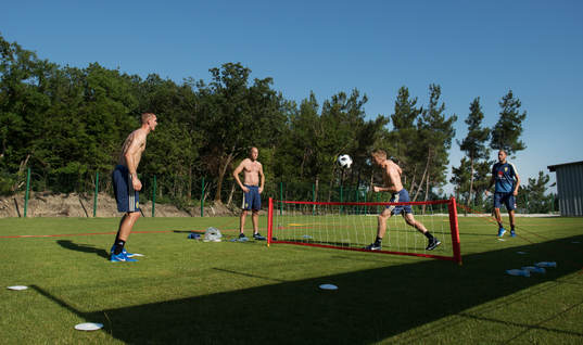 Robin Olsen, Andreas Granqvist and Sebastian Larsson of the Swedish national football team play football tennis