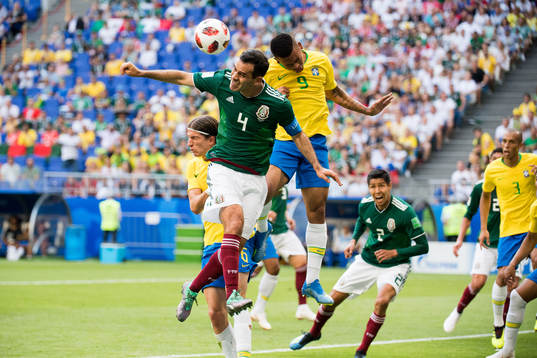 Rafael Marquez of Mexico and Gabriel Jesus of Brazil