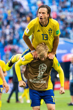 Gustav Svensson and Emil Forsberg of Sweden celebrate