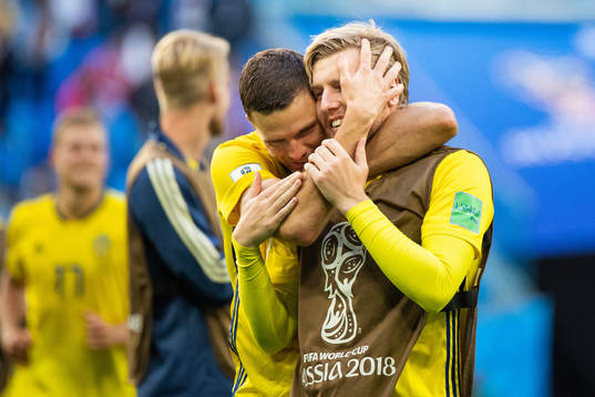 Marcus Berg and Emil Forsberg of Sweden celebrate