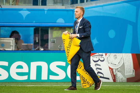 Sebastian Larsson of Sweden with a sign as he celebrate