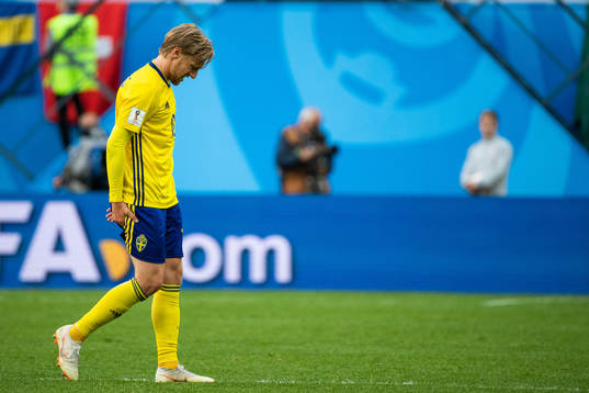 Emil Forsberg holds his back thigh as he is substituted
