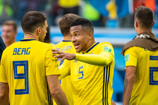 Marcus Berg and Martin Olsson of Sweden celebrate