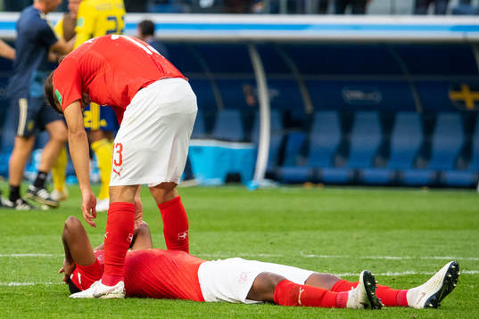 Ricardo Rodriguez and team mate looks dejected