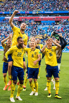Ola Toivonen and Isaac Kiese Thelin of Sweden celebrates