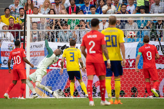 Dele Alli of England scores 0-2 behind goalkeeper Robin