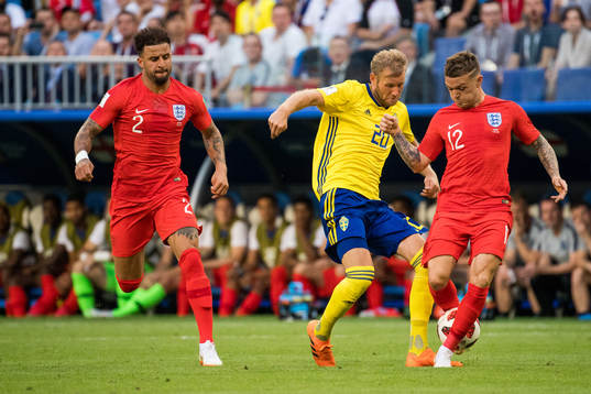 Kyle Walker of England, Ola Toivonen of Sweden and Kieran