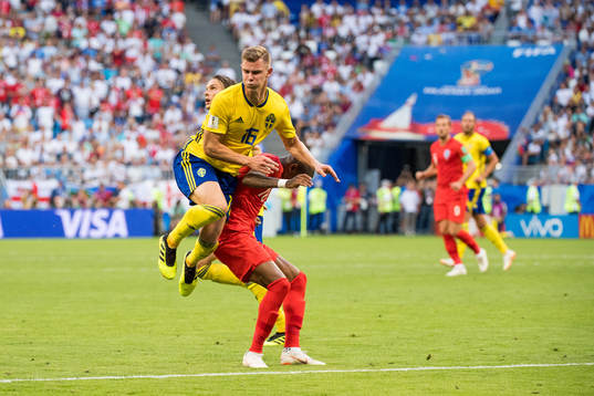 Emil Krafth of Sweden and Ashley Young of England