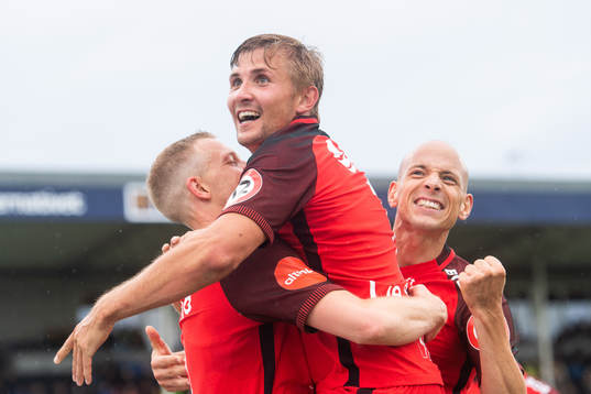 Peter Orry Larsen, Steffen Lie Skålevik and Ruben Kristiansen of Brann celebrates scoring 1-2