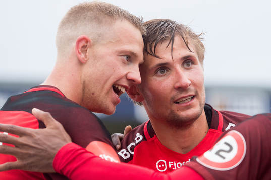 Peter Orry Larsen and Steffen Lie Skålevik of Brann celebrate the 1-2 goal