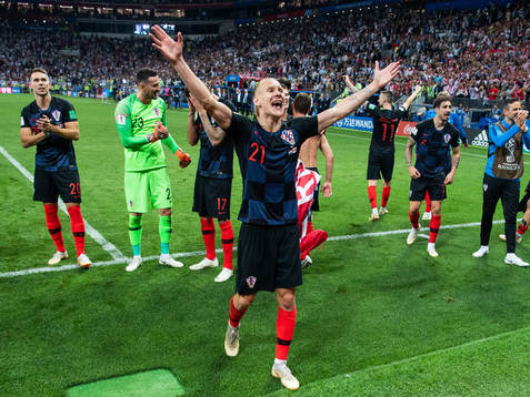 Domagoj Vida of Croatia celebrate