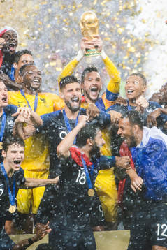 Players of France celebrate with the trophy