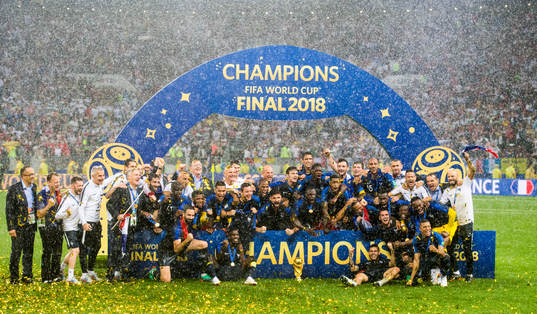 Players of France celebrate with the trophy