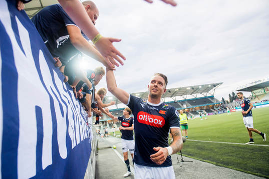 Claes Kronberg of Viking celebrates with the fans
