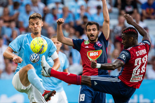 Markus Rosenberg of Malmö FF and Stopira of Vidi