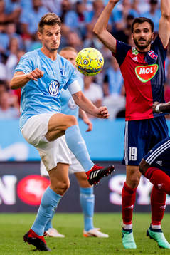 Markus Rosenberg of Malmö FF and Boban Nikolov of Vidiv