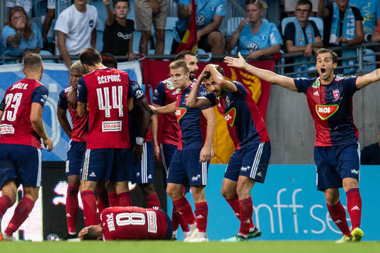 Loïc Nego of Vidi celebrate with team mates after scoring 1-1 and Anel Hadžić lies down after being hit by a bottle