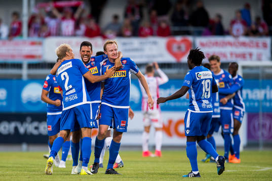 Lars Grorud, Marcos Vales Gonzalez, Christer Reppesgård Hansen and Victor Demba Bindia of Sandefjord celebrate