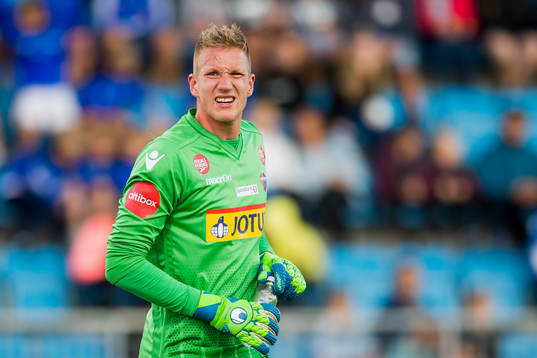 Goalkeeper Eirik Holmen Johansen of Sandefjord reacts to an injury during the Eliteserien match between Sandefjord and Tromsø on August 10, 2018 in Sandefjord.
