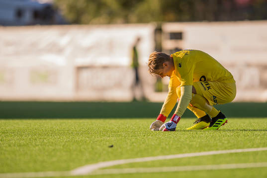 Goalkeeper Borger Thomas of Åsane looks dejected