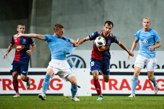 Anders Christiansen of Malmö FF against Boban Nikolov of Vidi