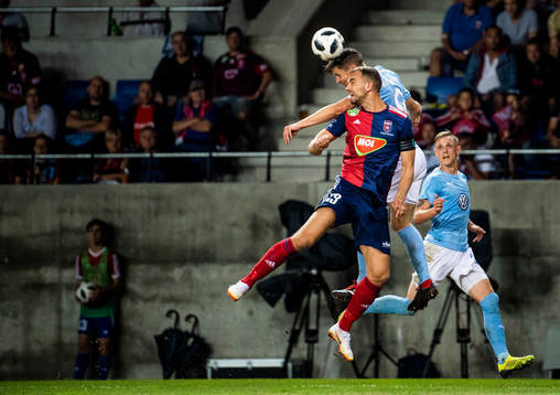 Boban Nikolov of Vidi fights for the ball with Markus Rosenberg of Malmö FF