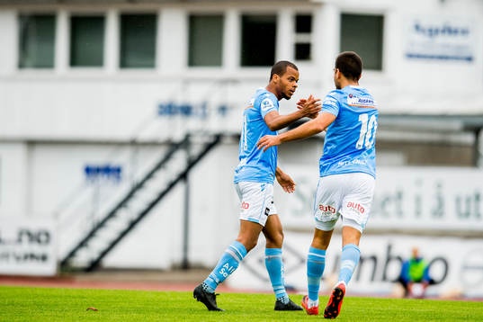 Erixon Danso of Sandnes Ulf celebrates with teammates Sanel Kapidzic after scoring 0-1