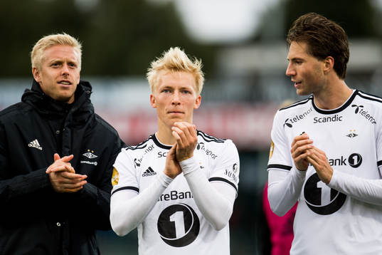 Goalkeeper Arild Østbø, Birger Meling and Marius Lundemo of Rosenborg celebrate