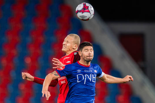  Kristoffer Barmen of Brann and Daniel Fredheim Holm of Vålerenga
