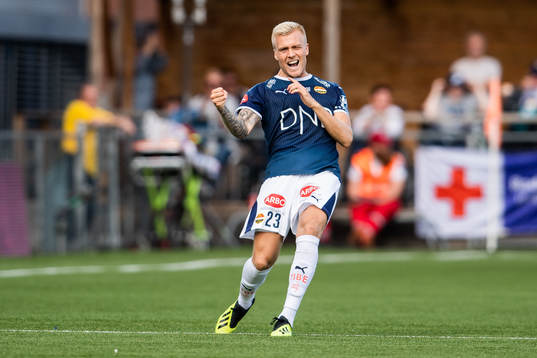 Eirik Ulland Andersen of Strømsgodset celebrates after 2-2