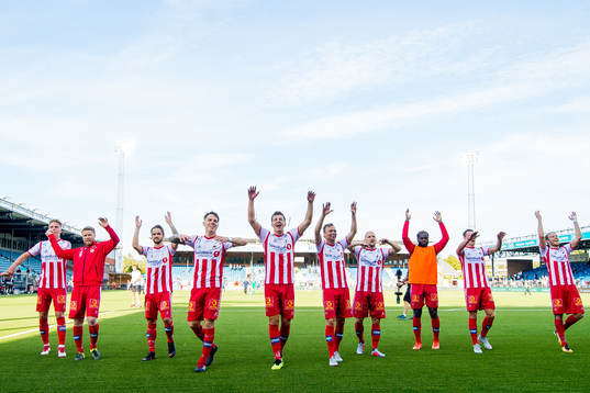 Players of Tromsø celebrate