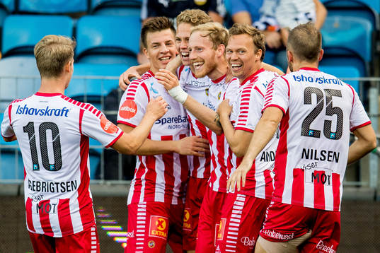 Onni Johannes Simonpoika Valakari of Tromsø celebrates with teammates Mikael Nord Ingebrigtsen, Jostein Gundersen, Gjermund Åsen, Magnus Andersen and Lasse Nilsen after scoring 2-4 during the Eliteserien match between Strømsgodset and Tromsø on September 1, 2018 in Drammen.

