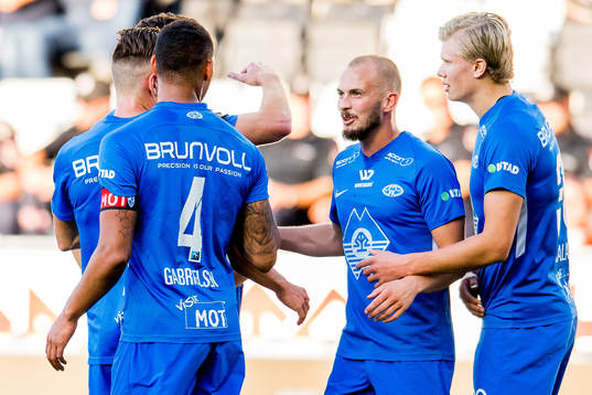 Ruben Gabrielsen of Molde celebrates with teammates Eirik Hestad and Erling Braut Håland after scoring 0-1