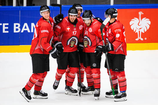 Mats Rosseli Olsen (second to the right) celebrates with