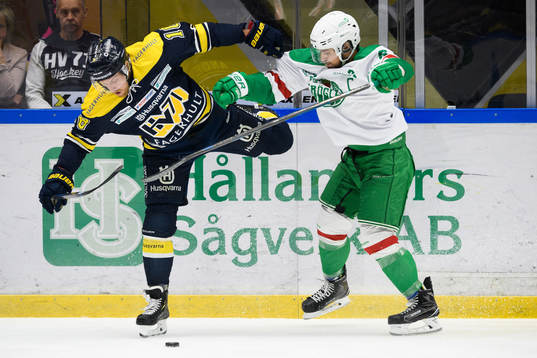 s Joakim Andersson och Rögles Craig Schira