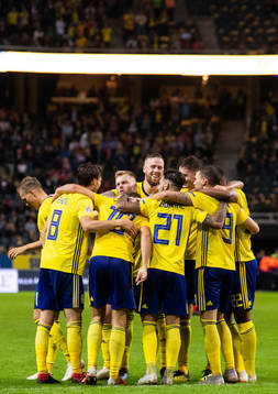 The players of Sweden celebrates after the 2-0 goal from Viktor Claesson