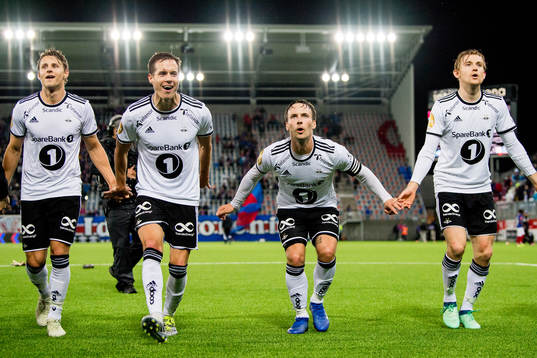 Vegar Eggen Hedenstad, Anders Konradsen, Mike Jensen and Yann-Erik de Lanlay of Rosenborg celebrate